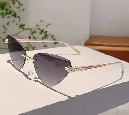 Retro Metal Rimless Triangle Sunglasses